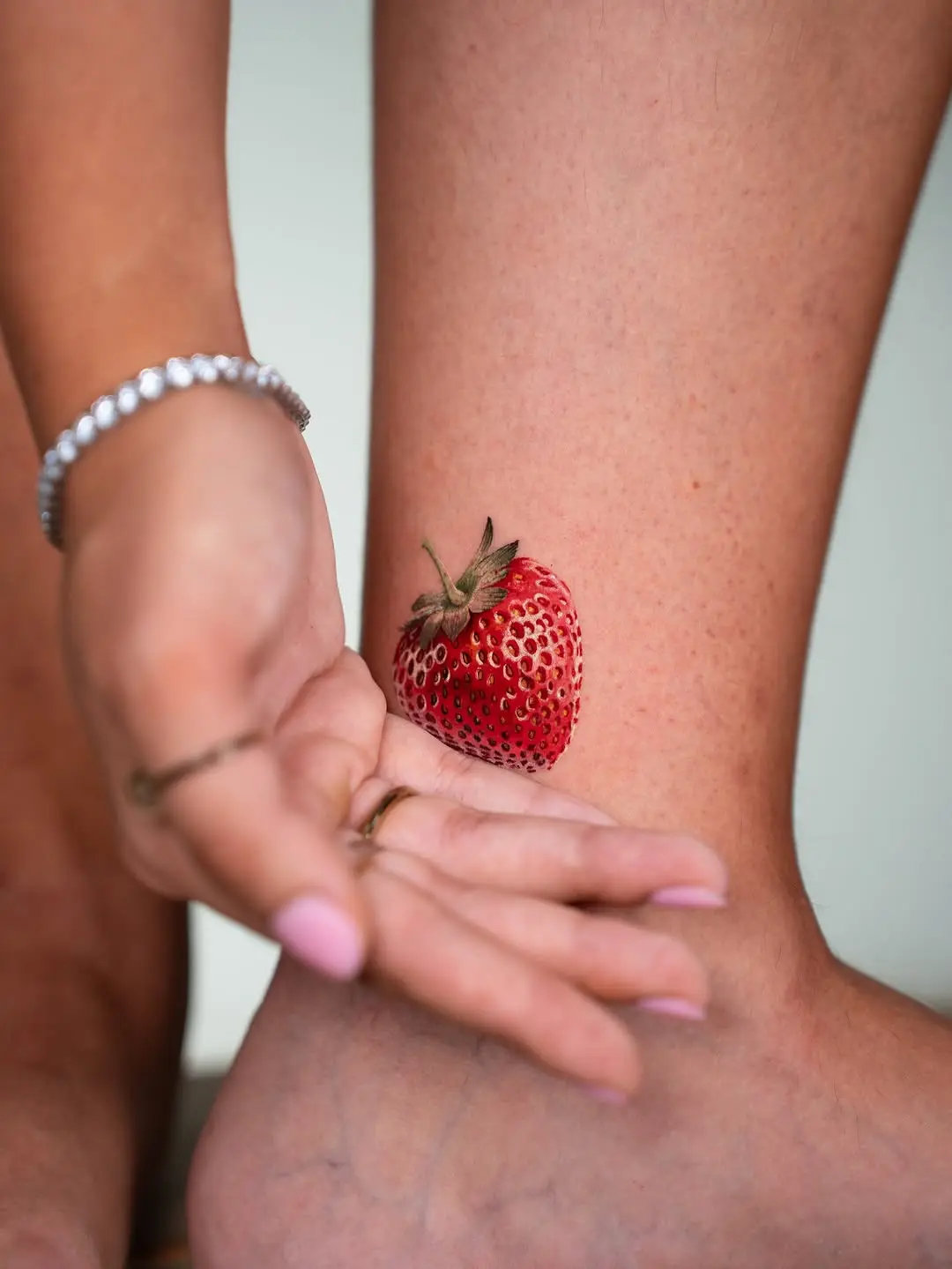 Vivid Strawberry Tattoo on Ankle