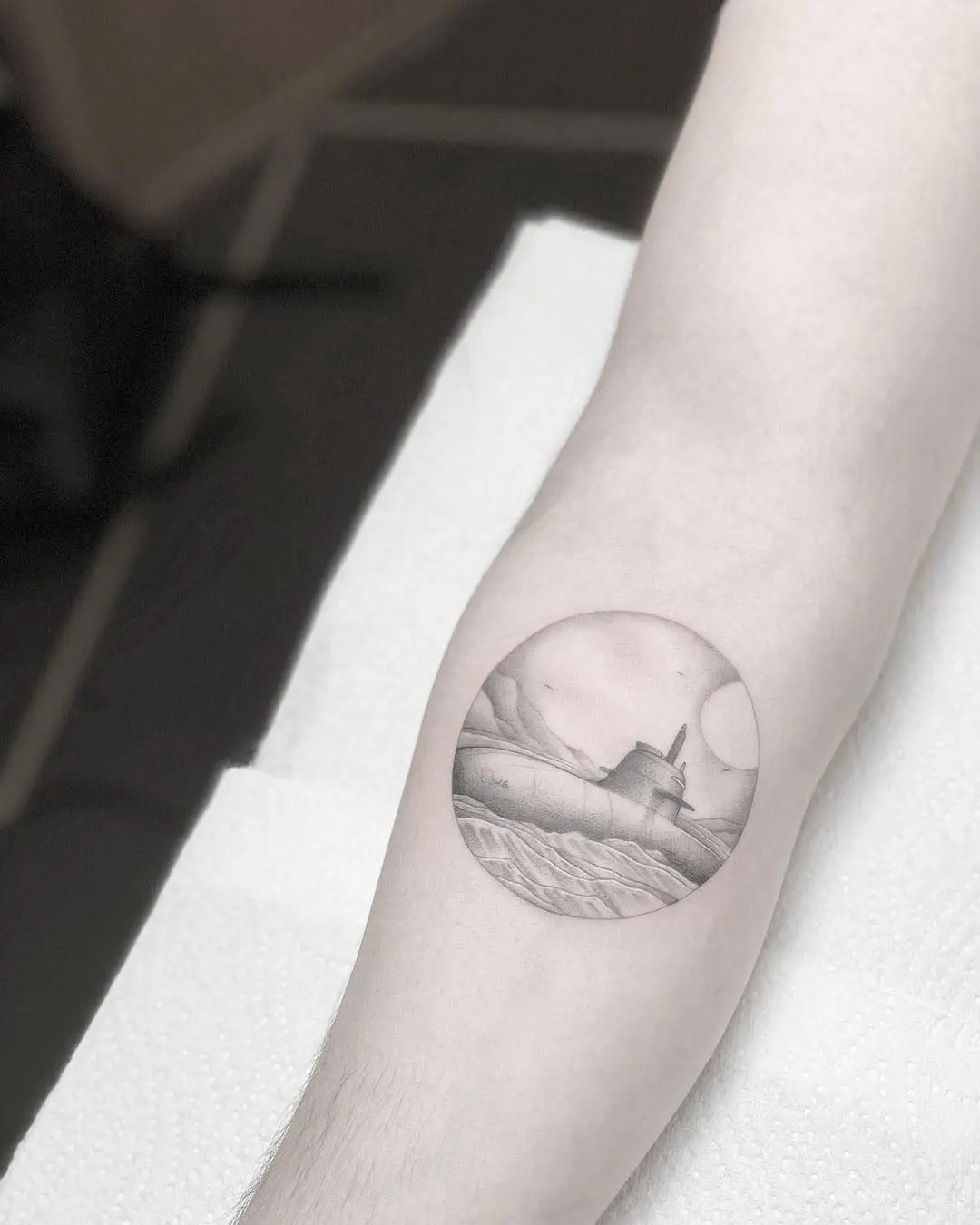 Intricate submarine tattoo in monochrome style