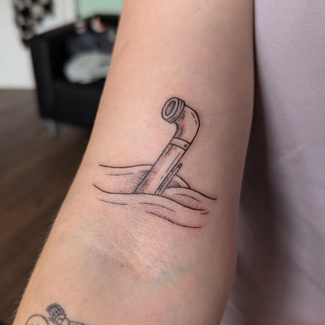 Unique submarine tattoo with ripple effects