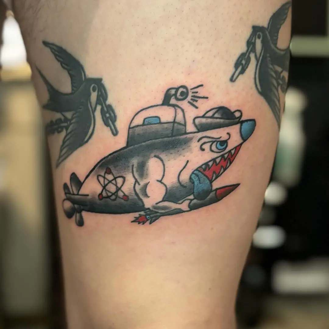 Bold submarine tattoo with a fierce aesthetic