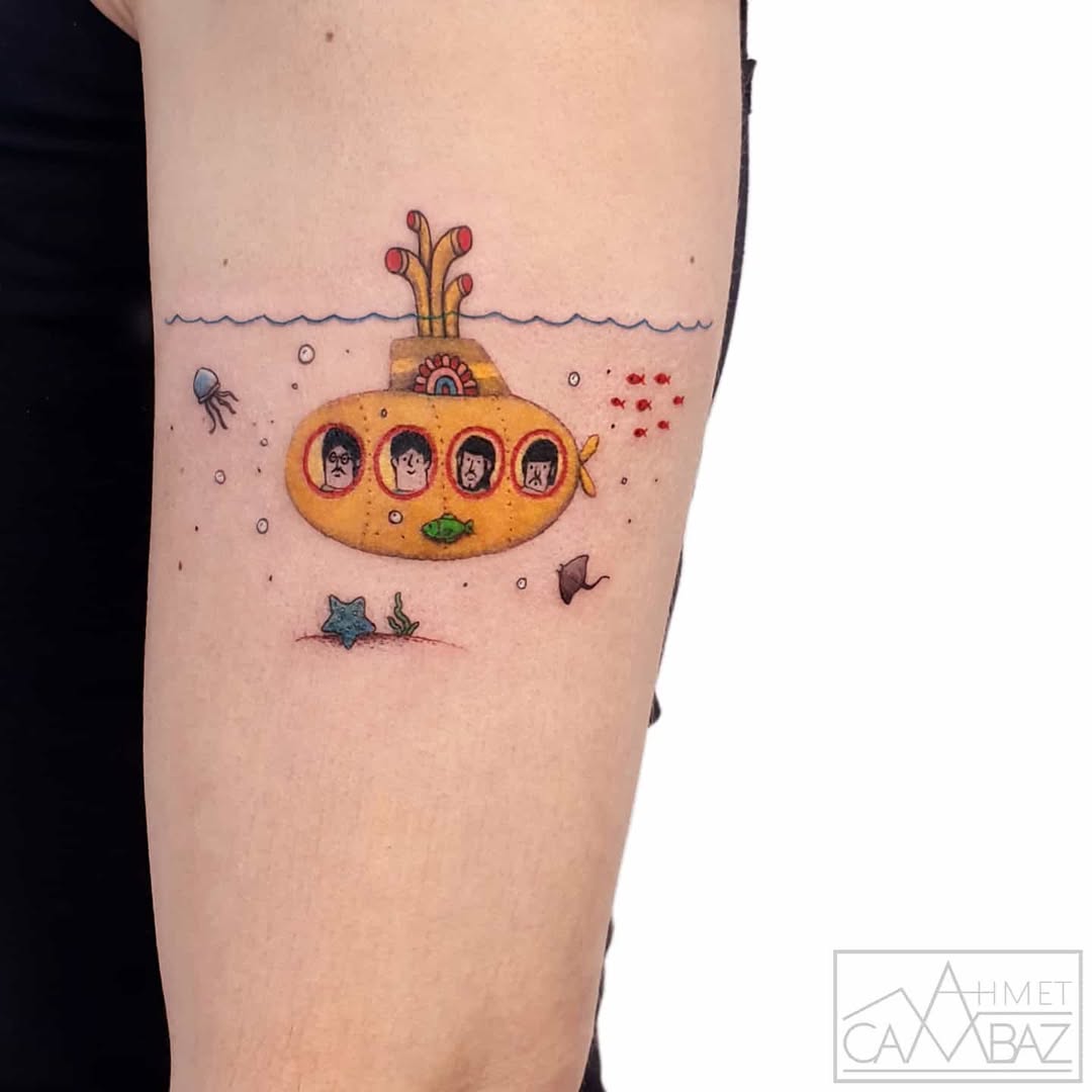 Whimsical submarine tattoo with colorful details