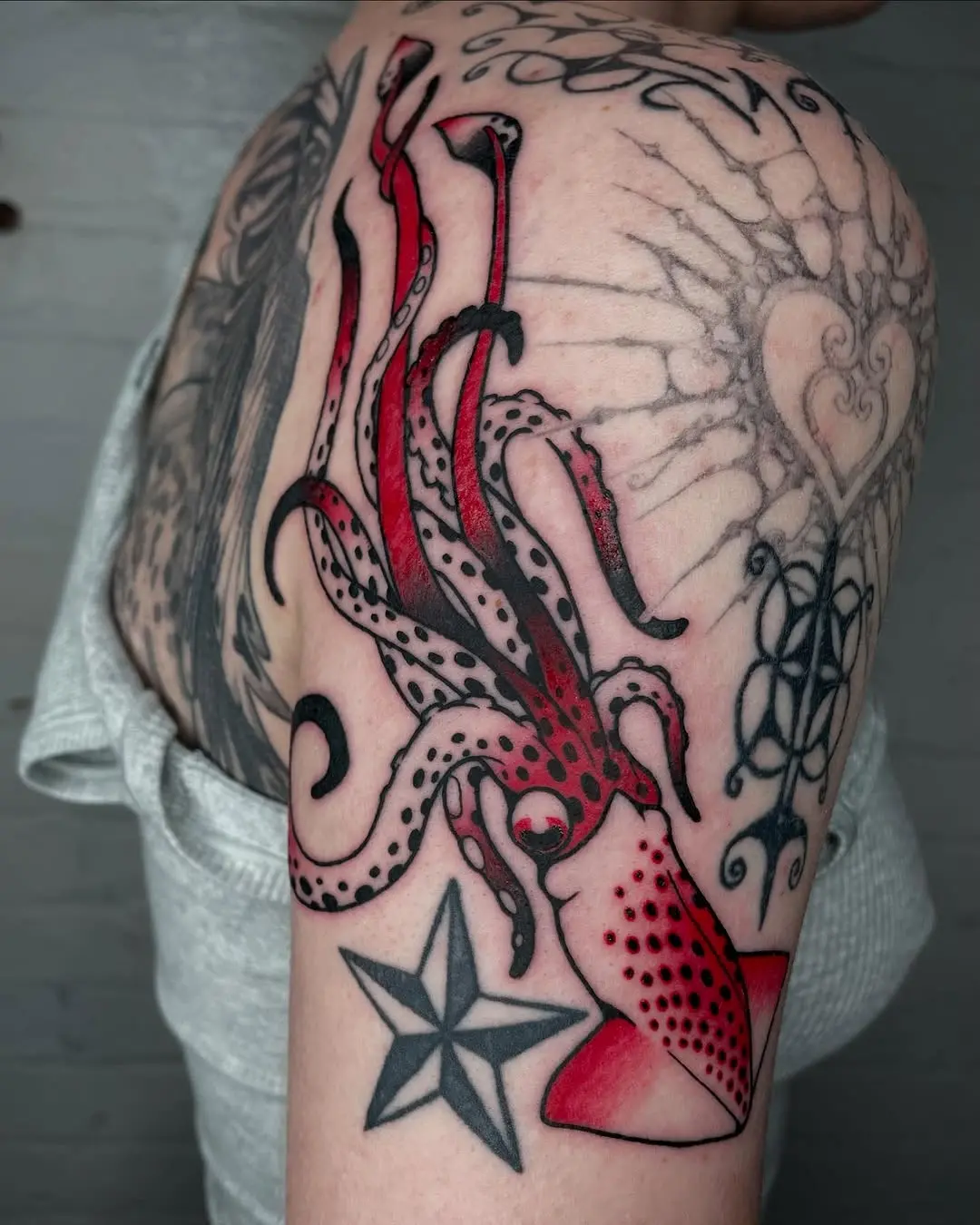 Bold squid tattoo with intricate detailing