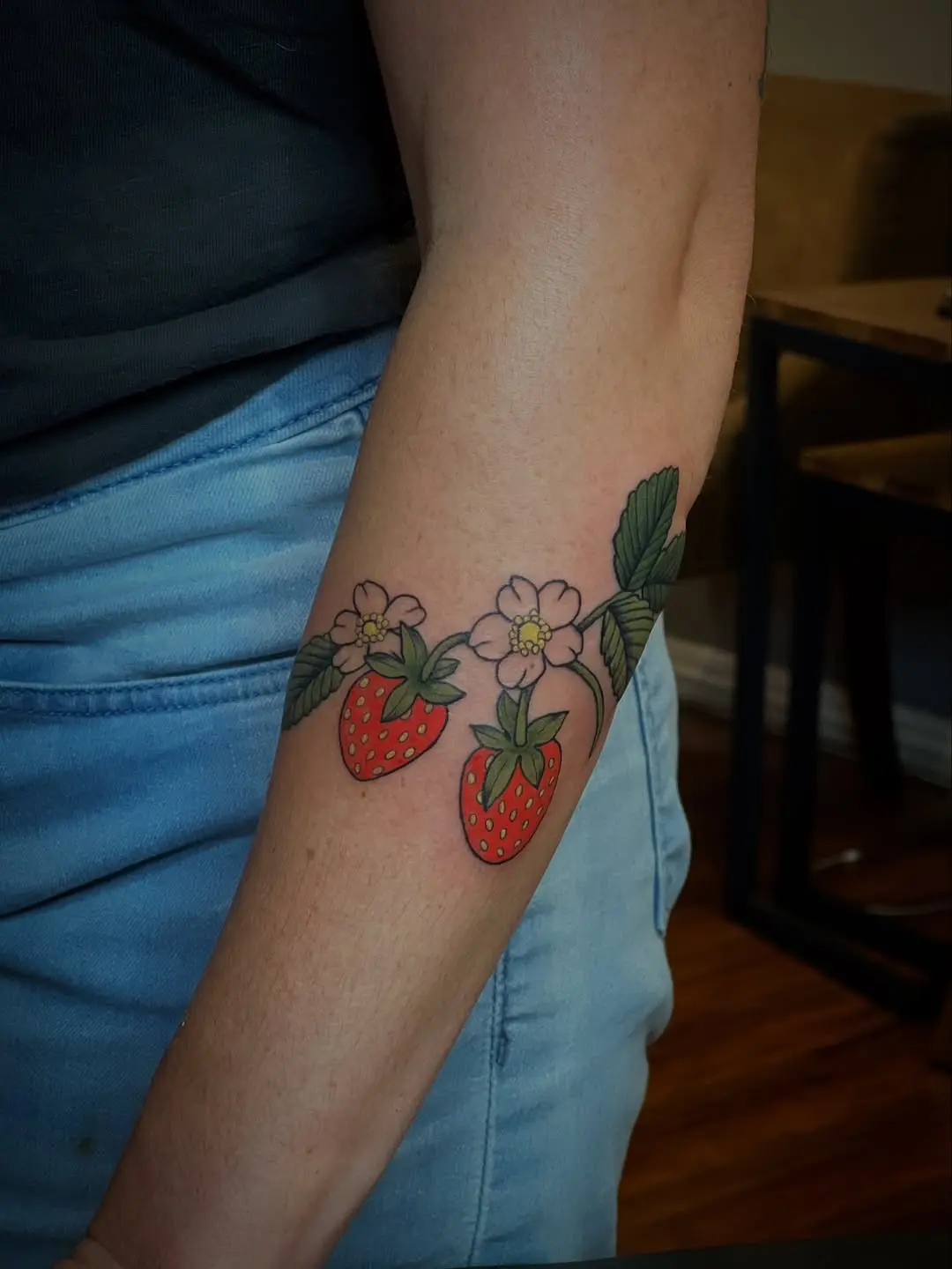 Colorful Strawberry Tattoo with Floral Touch