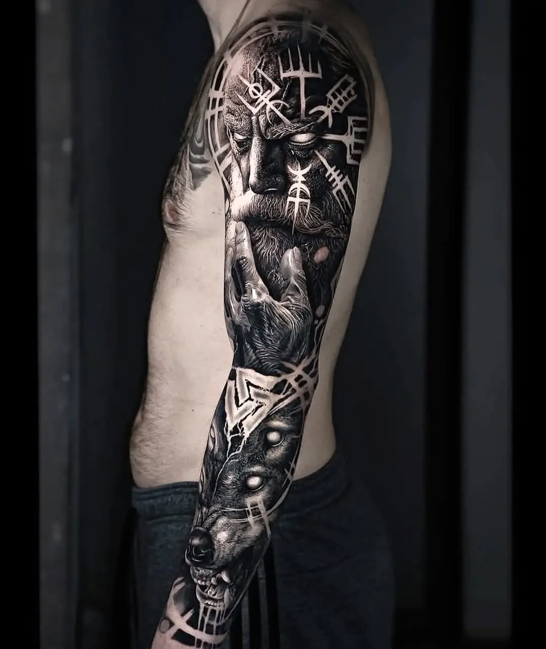 Intricate Viking Tattoo with Wolf Imagery