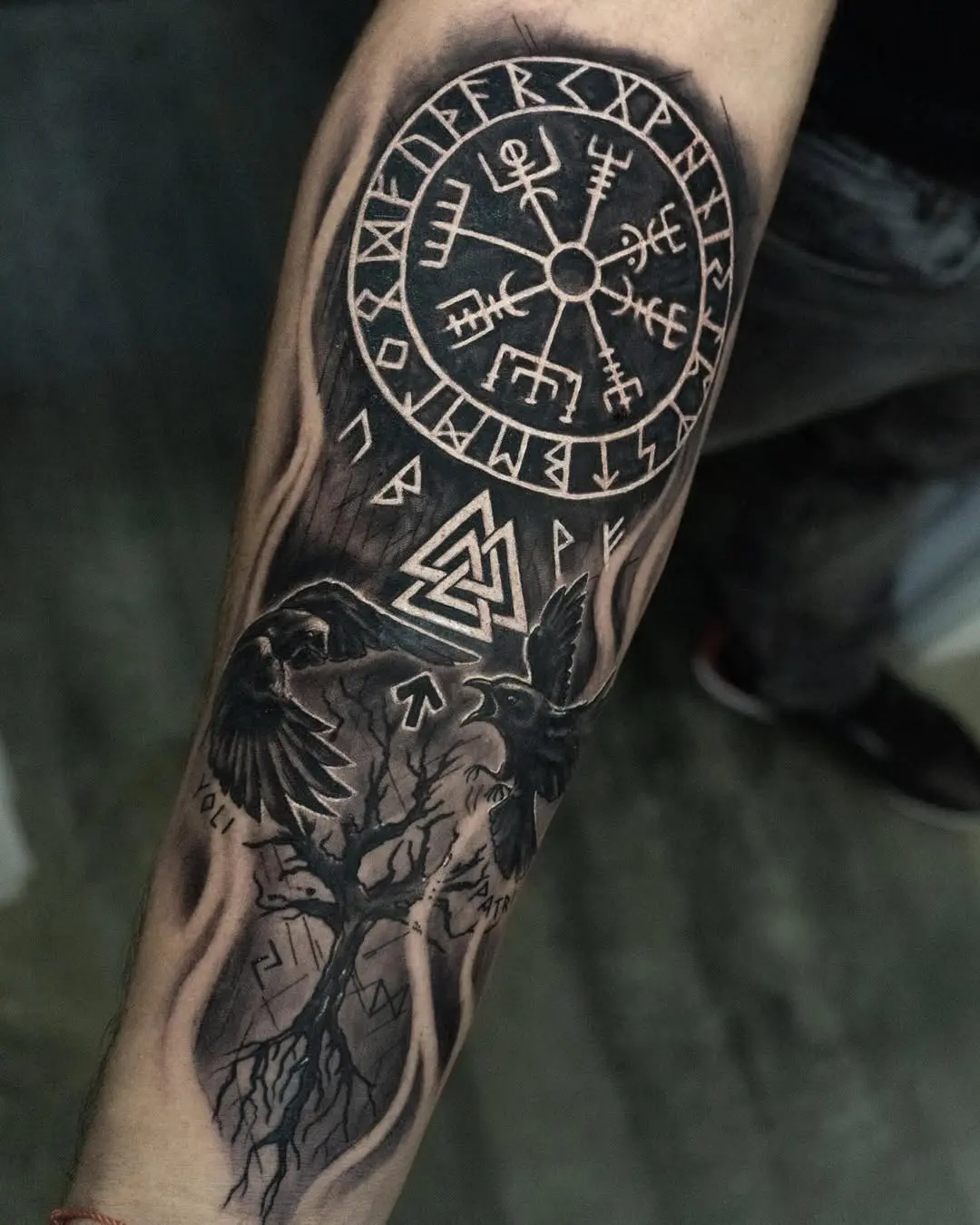 Intricate Viking tattoo with symbolism and history