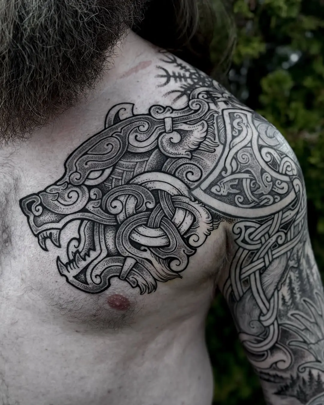 Intricate Viking Wolf Tattoo Design