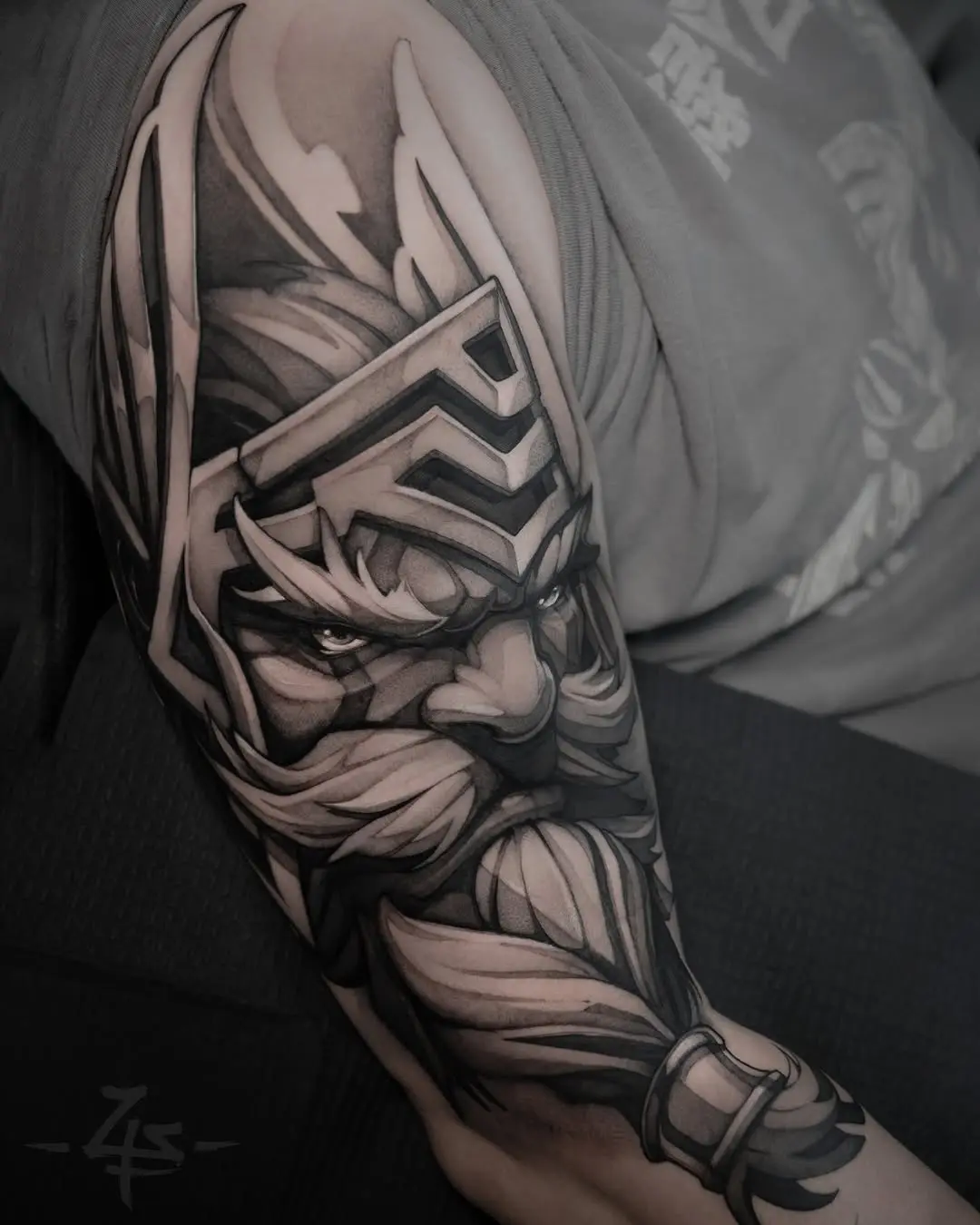 Bold Viking Warrior Face Tattoo in Black Ink