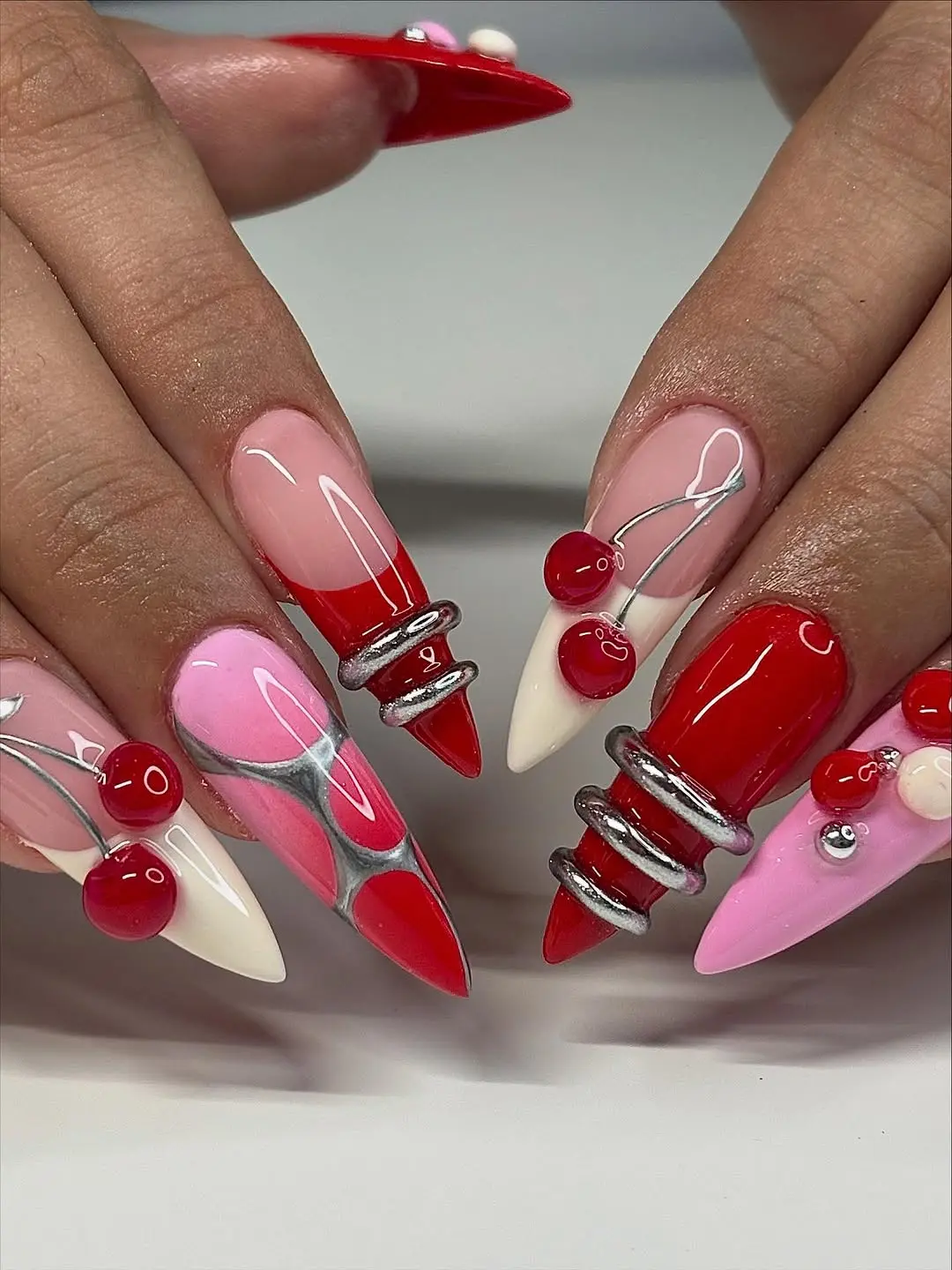 Vibrant 3D Cherry-Inspired Nail Art Madness