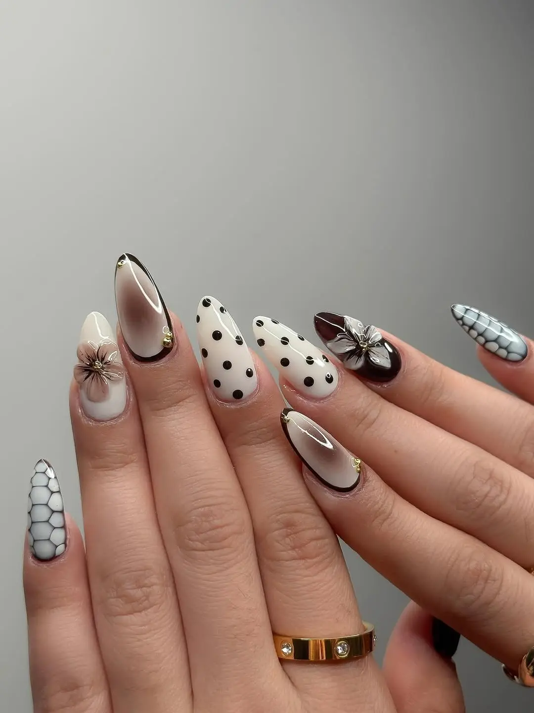Elegant 3D floral designs on stylish nails