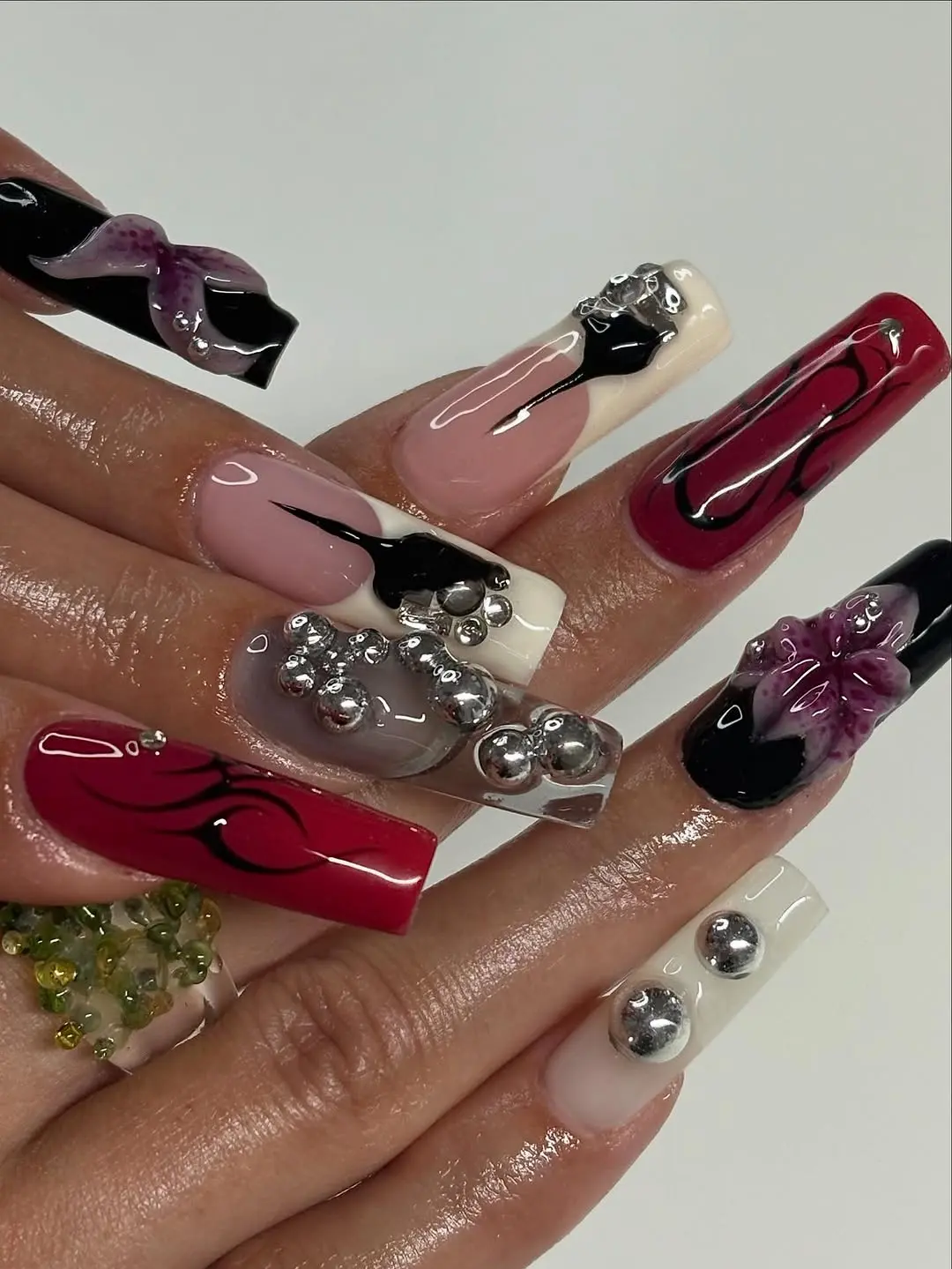 Glamorous 3D Nail Art in Bold Colors