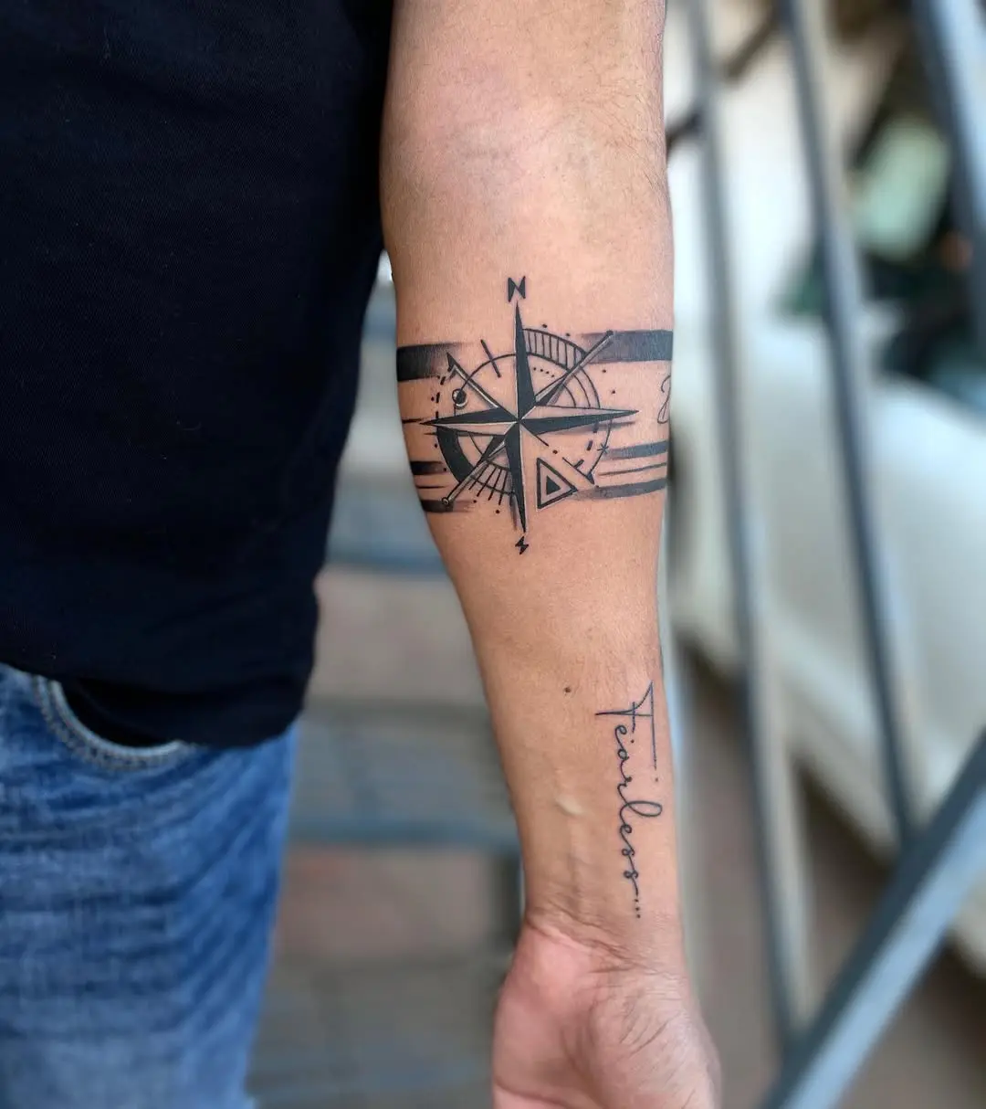 Stylish compass design armband tattoo inspiration