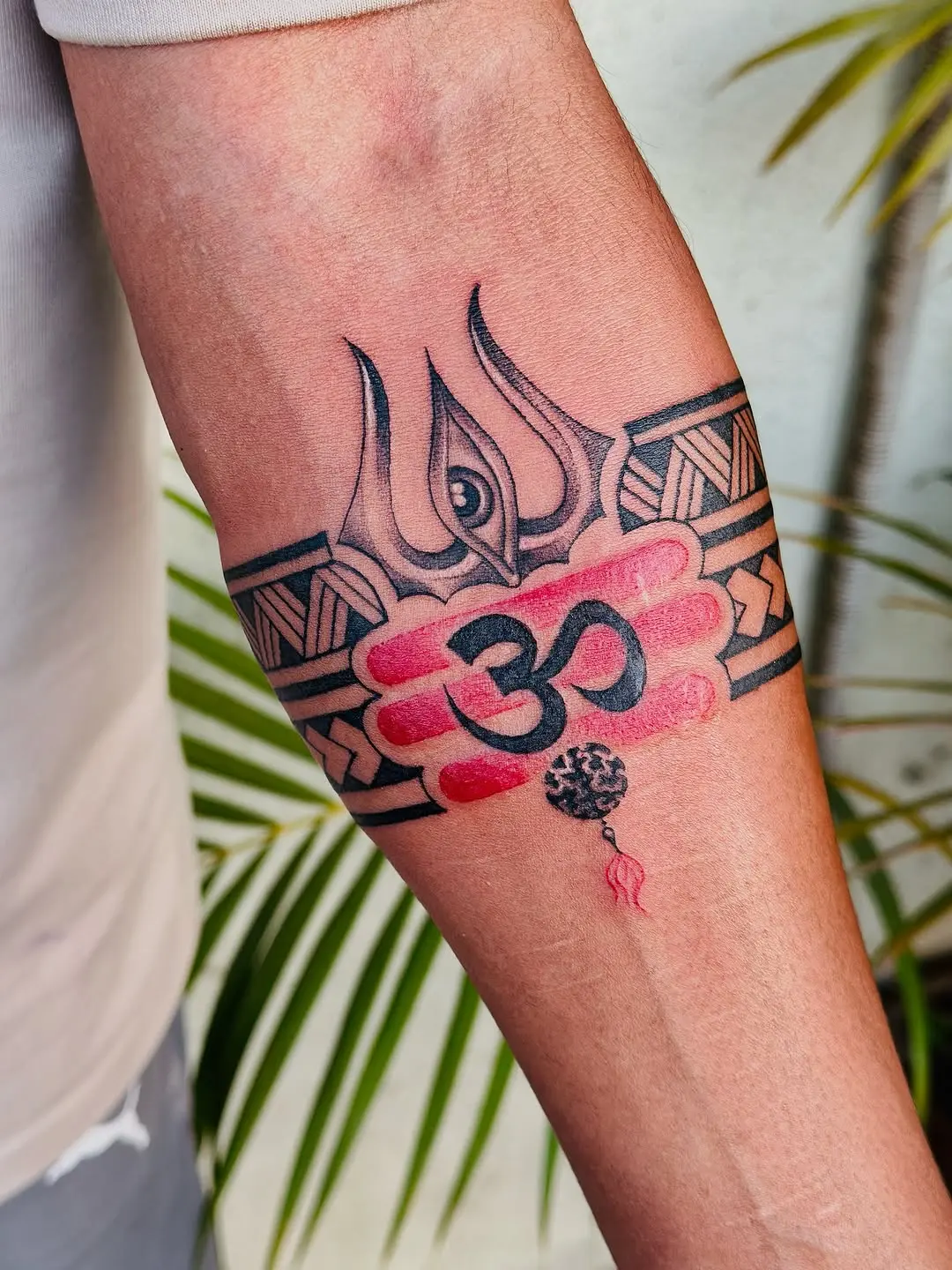 Vibrant spiritual armband tattoo design inspiration
