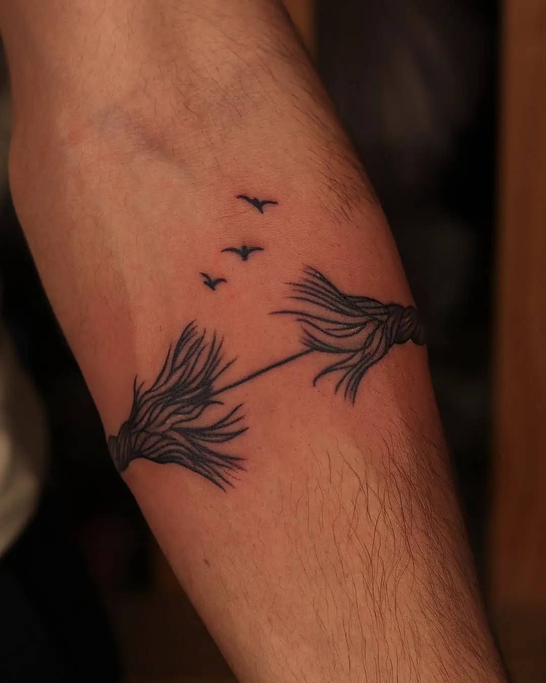Unique armband tattoo with knot and birds
