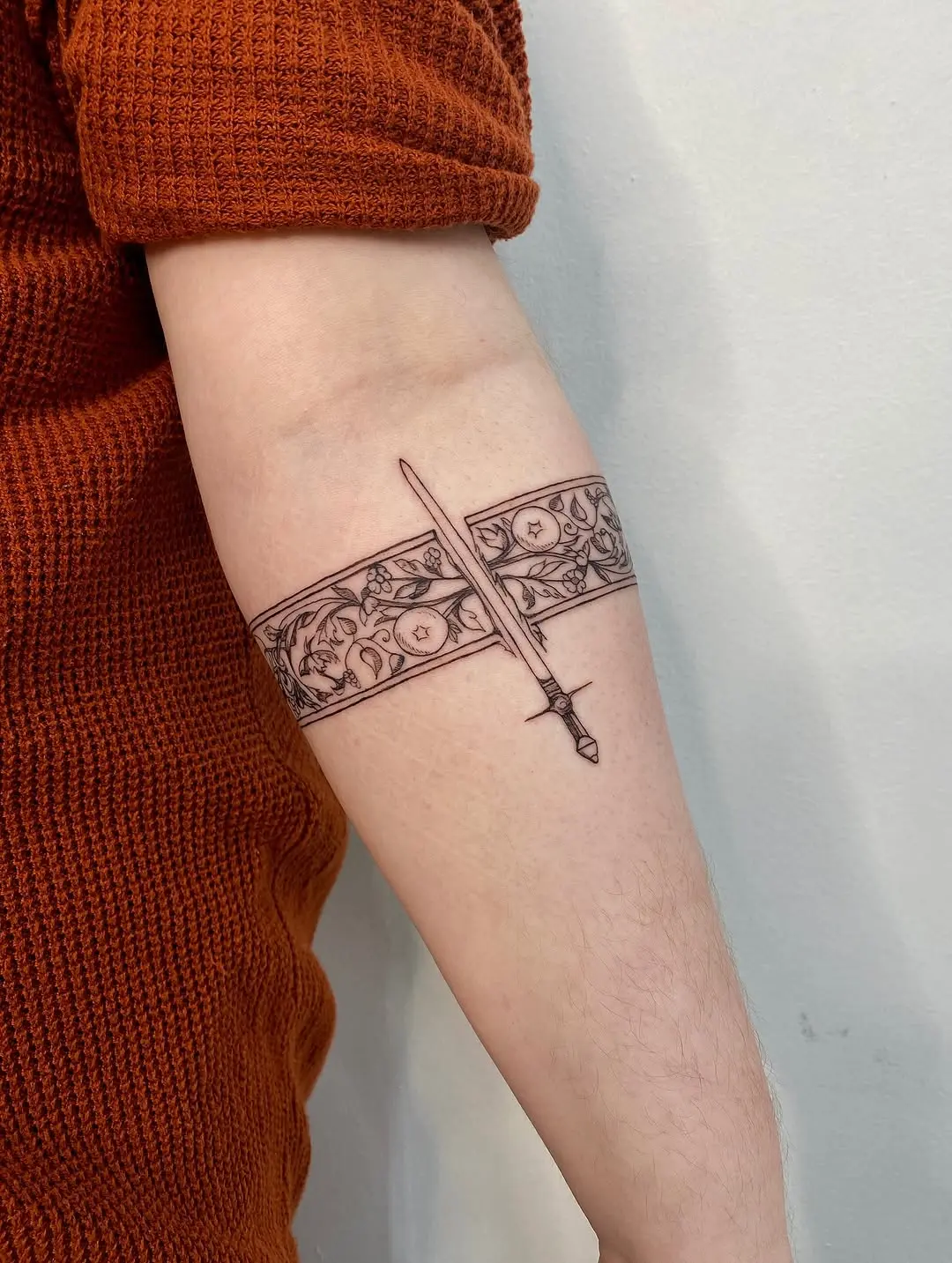Elegant sword design with floral accents