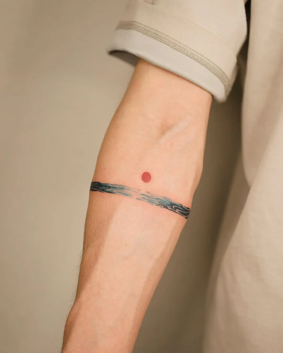 Minimalist armband tattoo with serene vibes