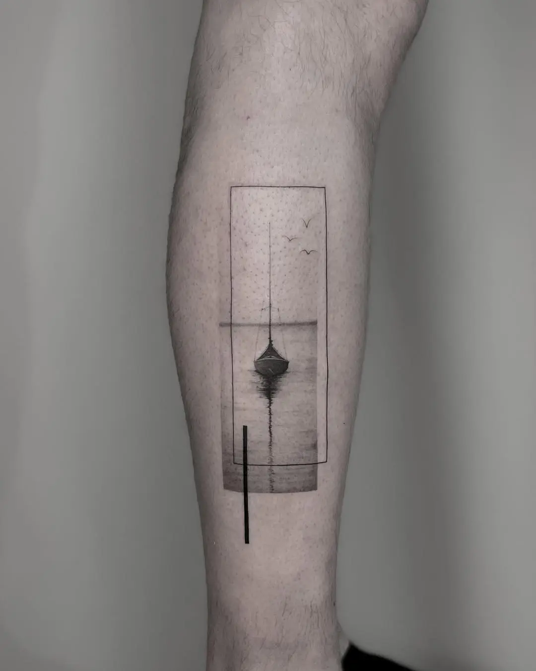 Minimalist boat tattoo reflecting serene ocean vibes