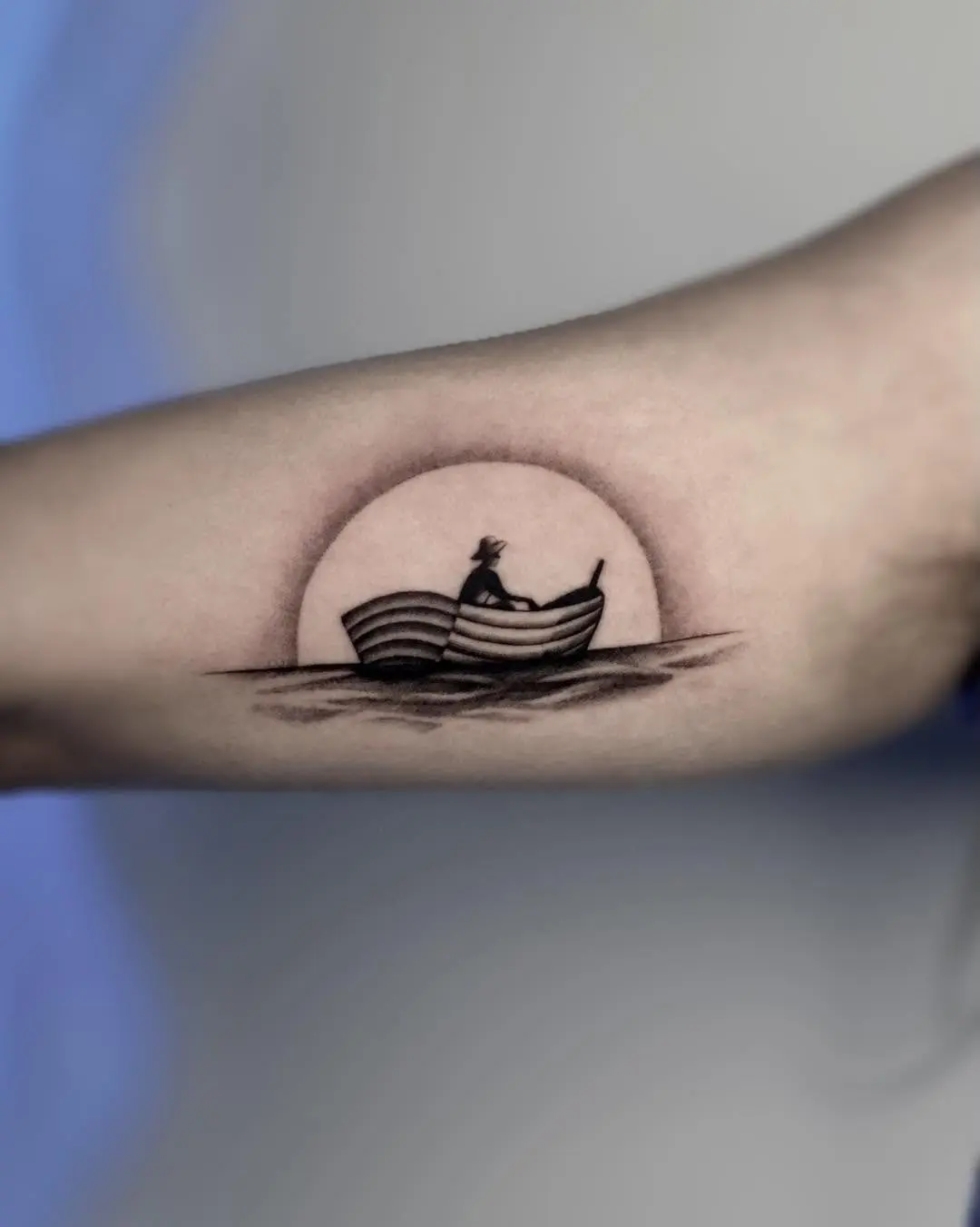 Stunning sunset silhouette boat tattoo design