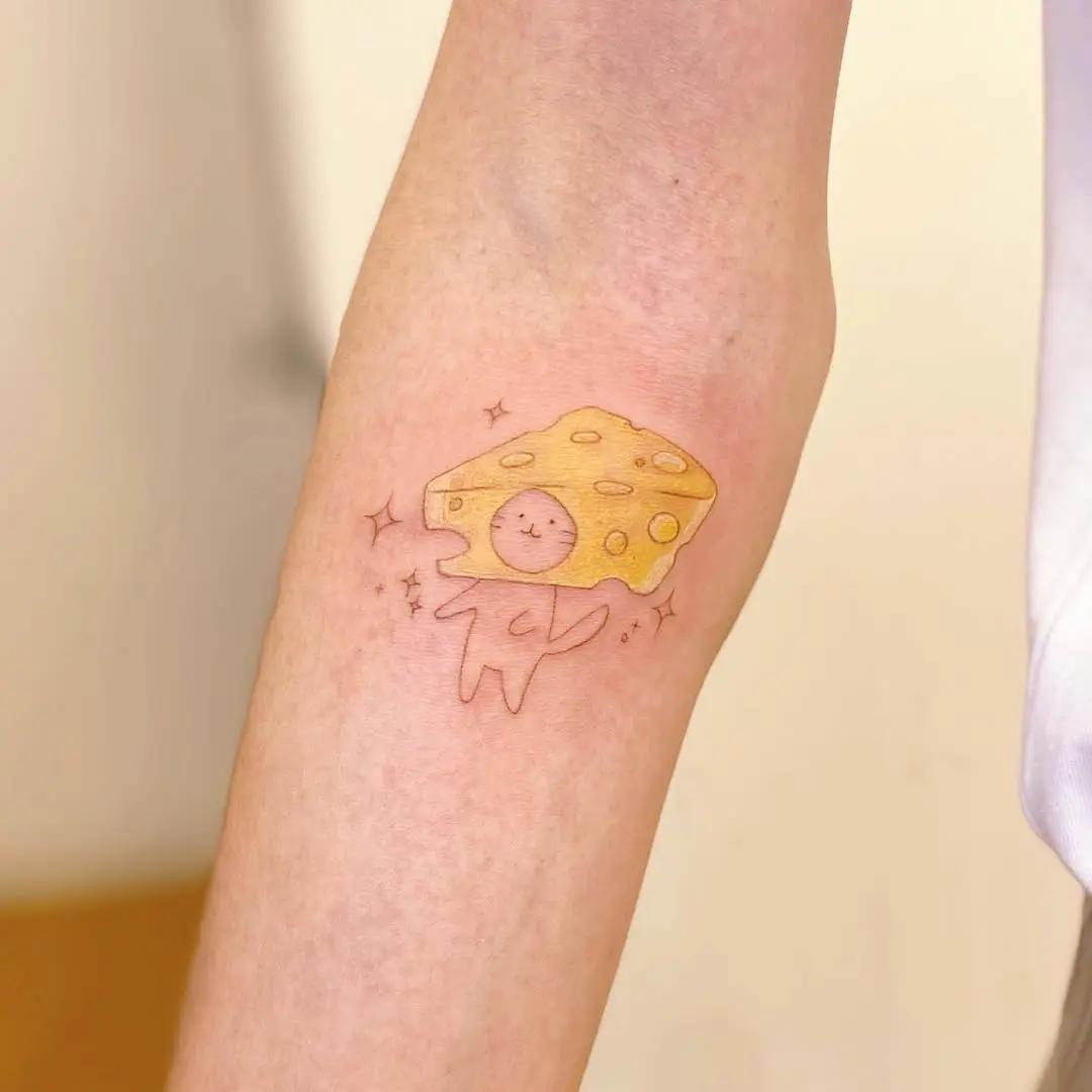 Adorable cheese tattoo with cartoon vibes