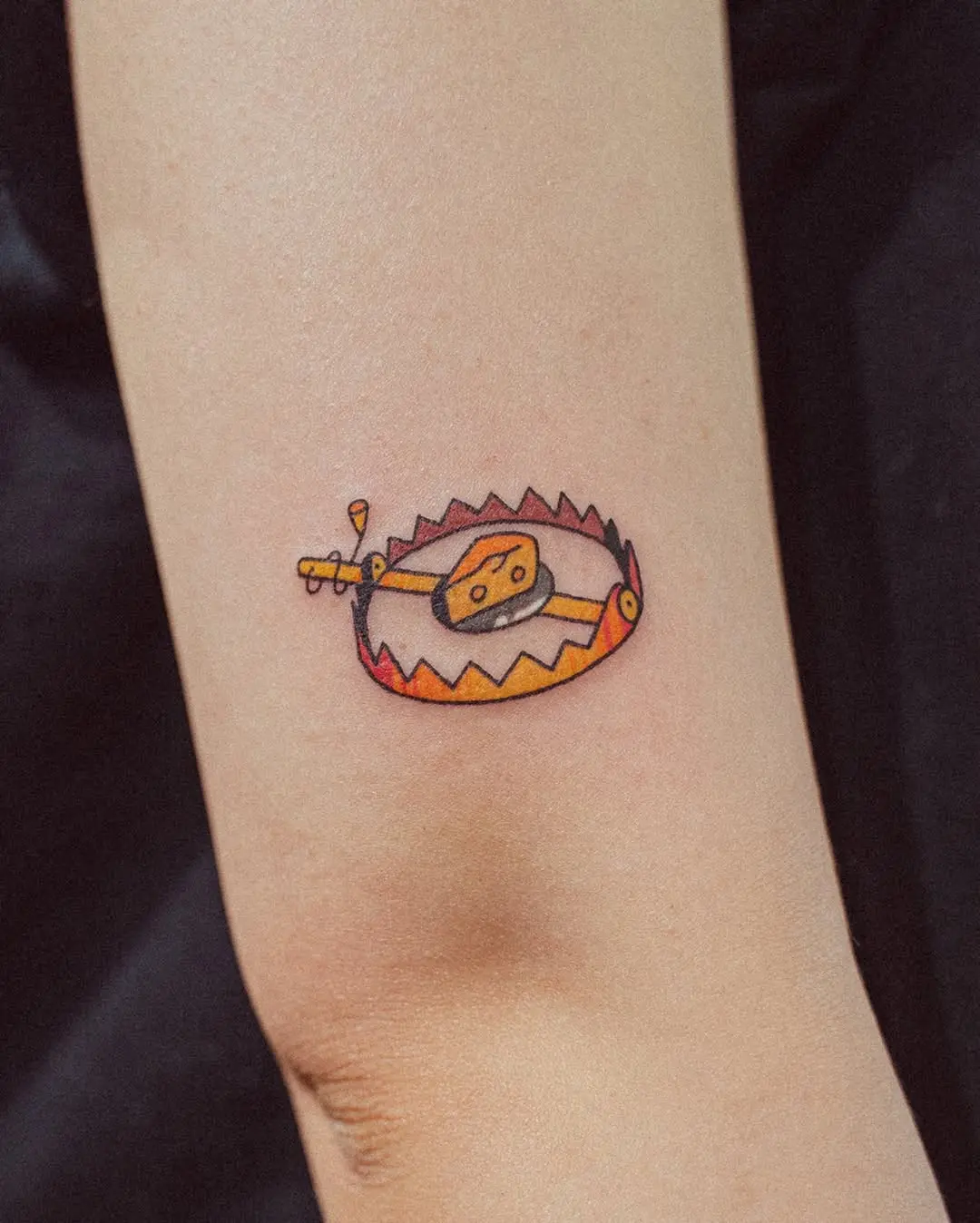 Fun cheese tattoo with a playful twist