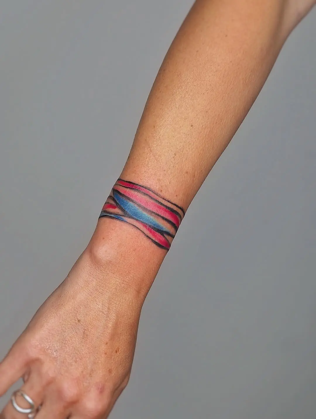 Vibrant and Abstract Armband Tattoo Design