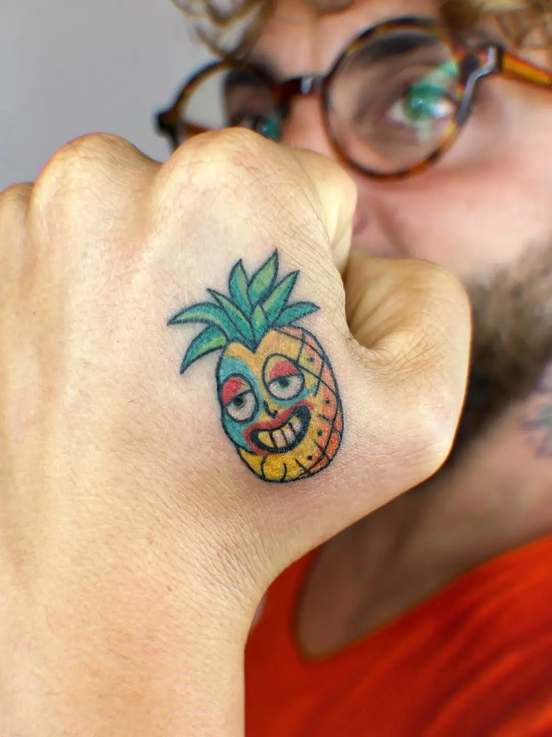 Playful pineapple tattoo with vibrant colors