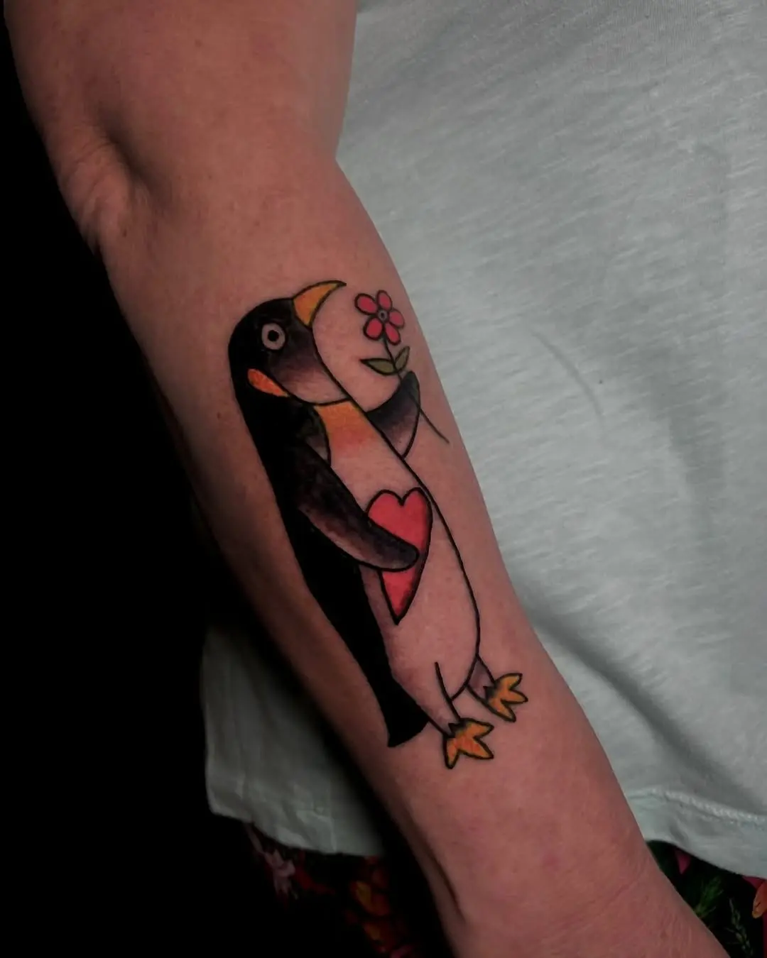 Charming Penguin Tattoo with Heart and Flower