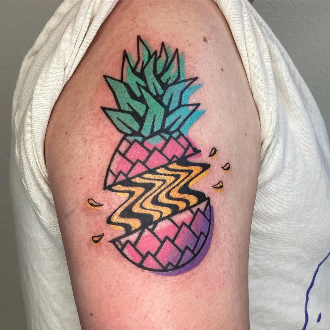 Vibrant and modern pineapple tattoo design