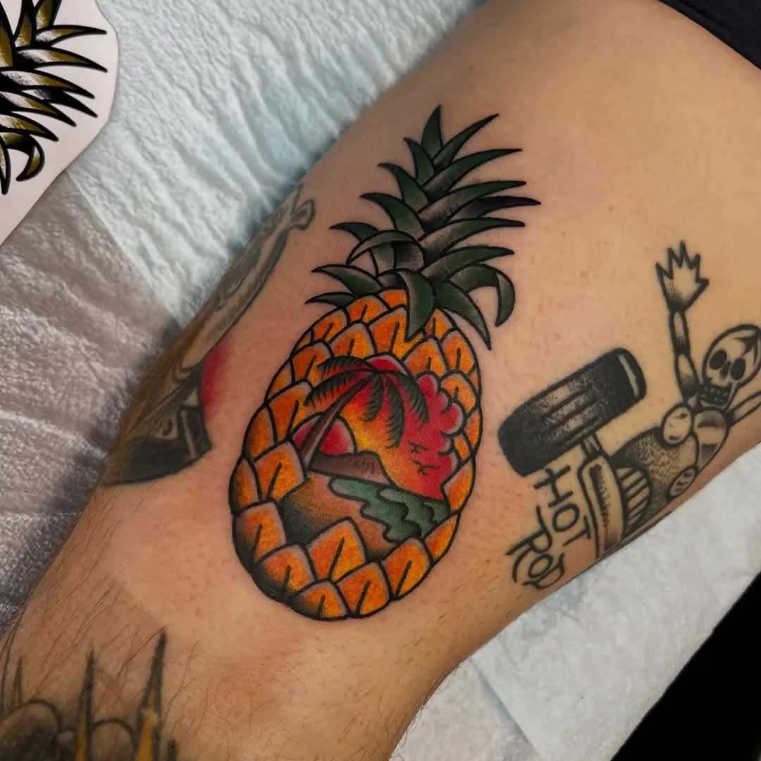 Vibrant pineapple tattoo exuding tropical vibes