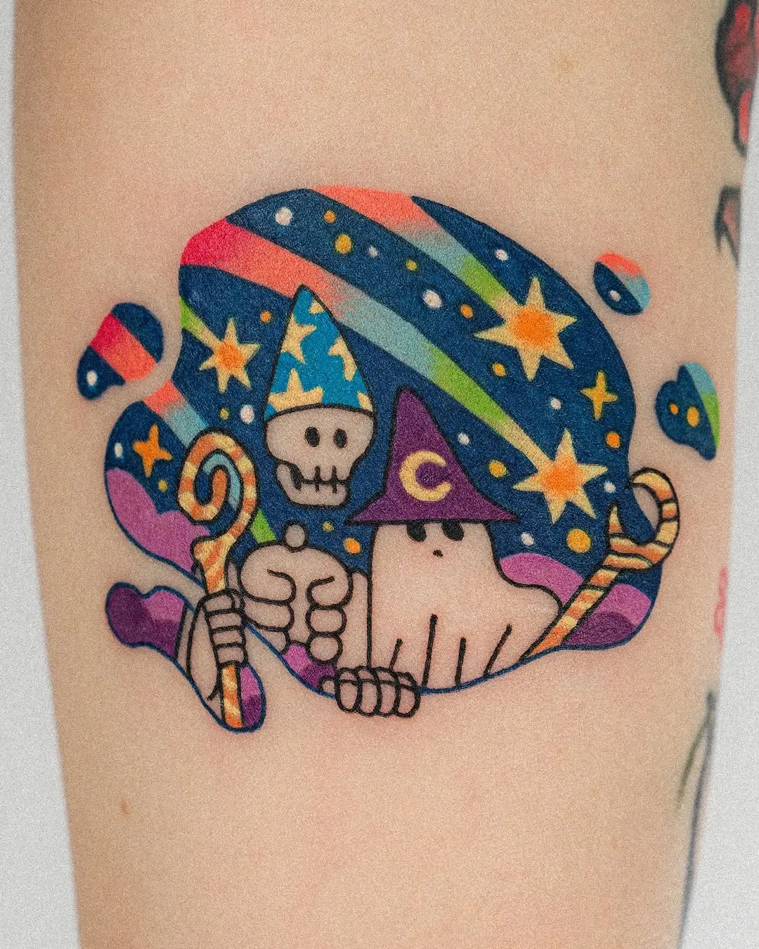 Whimsical shooting star tattoo with magical elements