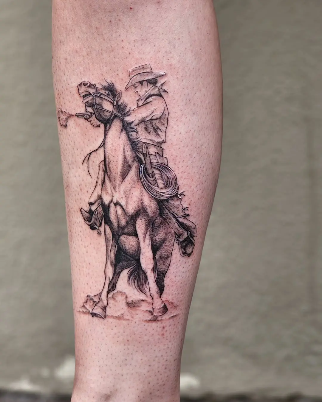 Dynamic Cowboy on Horse Tattoo Design