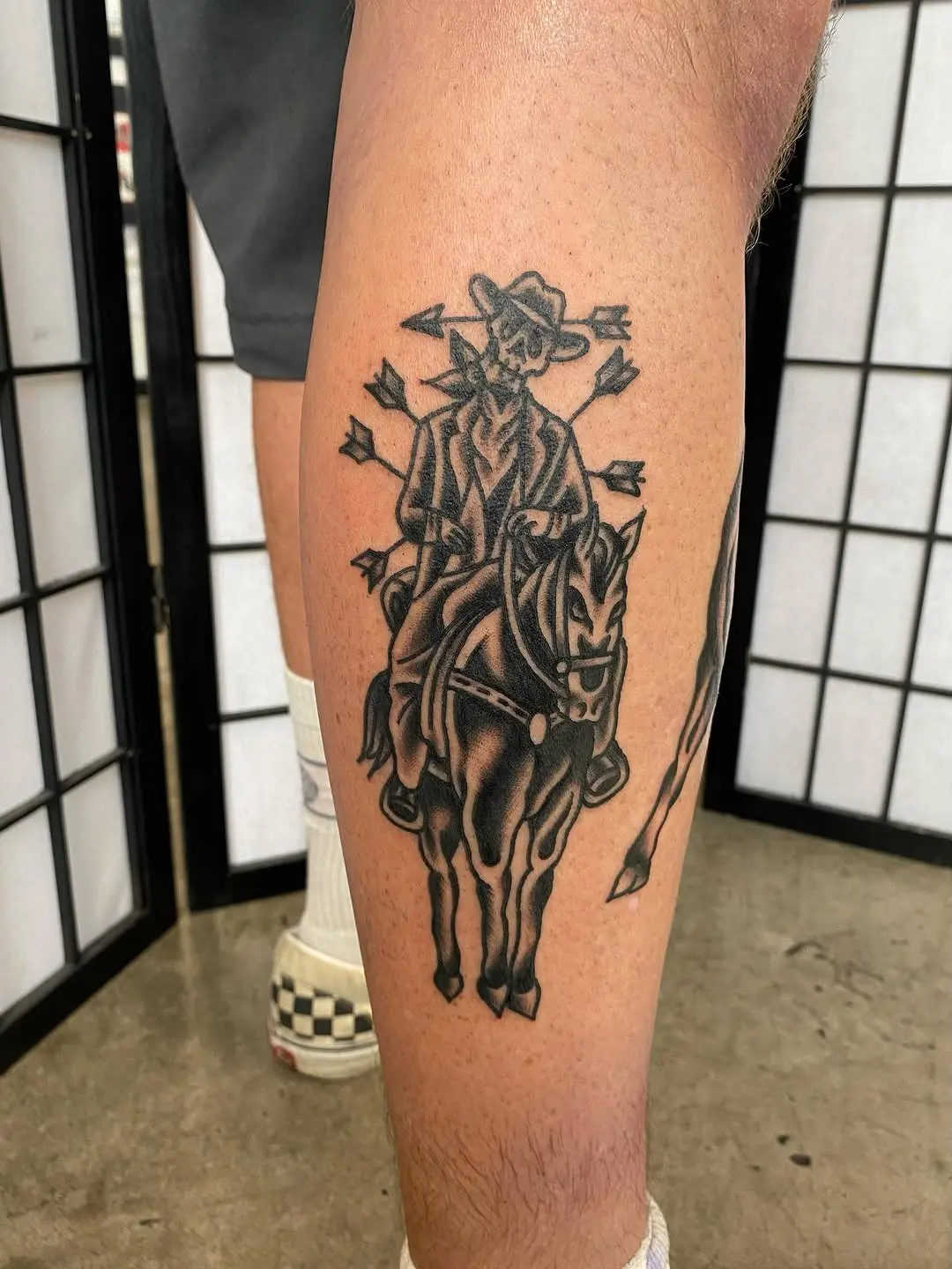 Stunning cowboy tattoo combining skull and horse