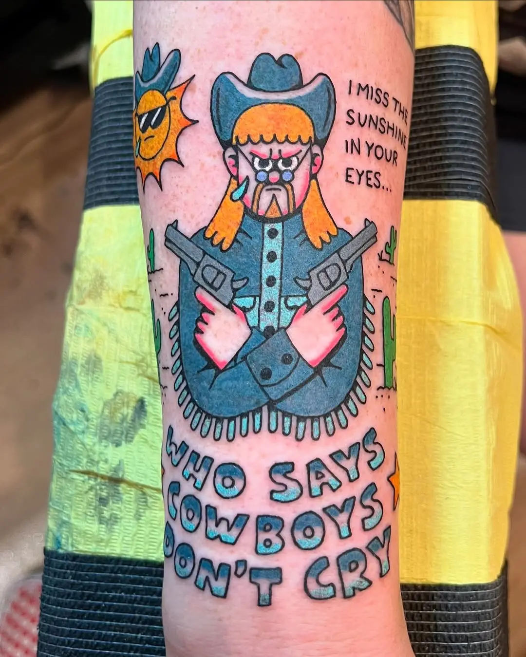 Bold and colorful cowboy tattoo design