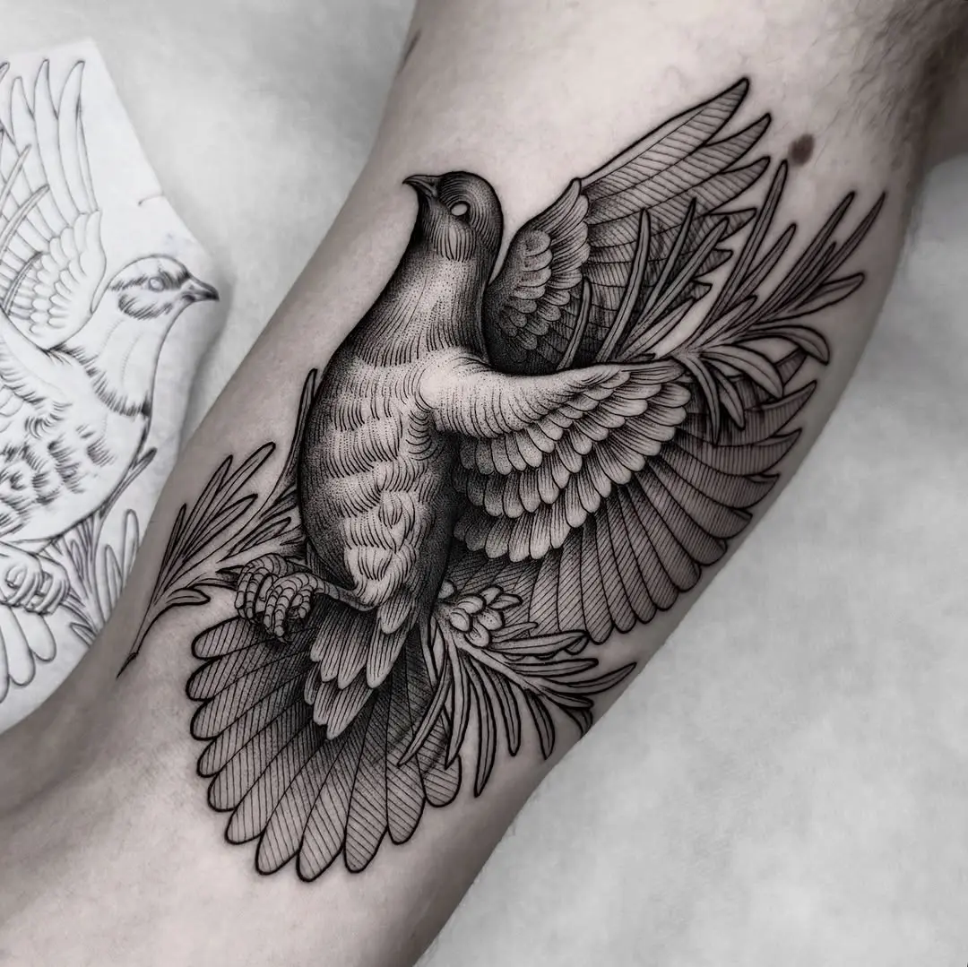 Elegant dove tattoo capturing freedom and peace