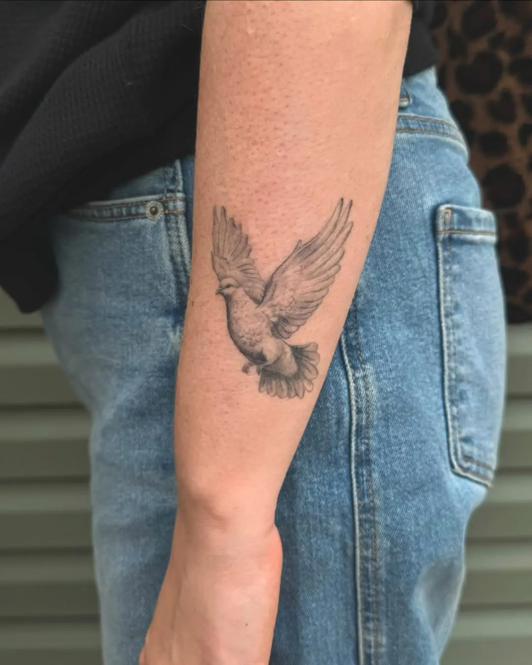 Elegant dove tattoo for a serene vibe