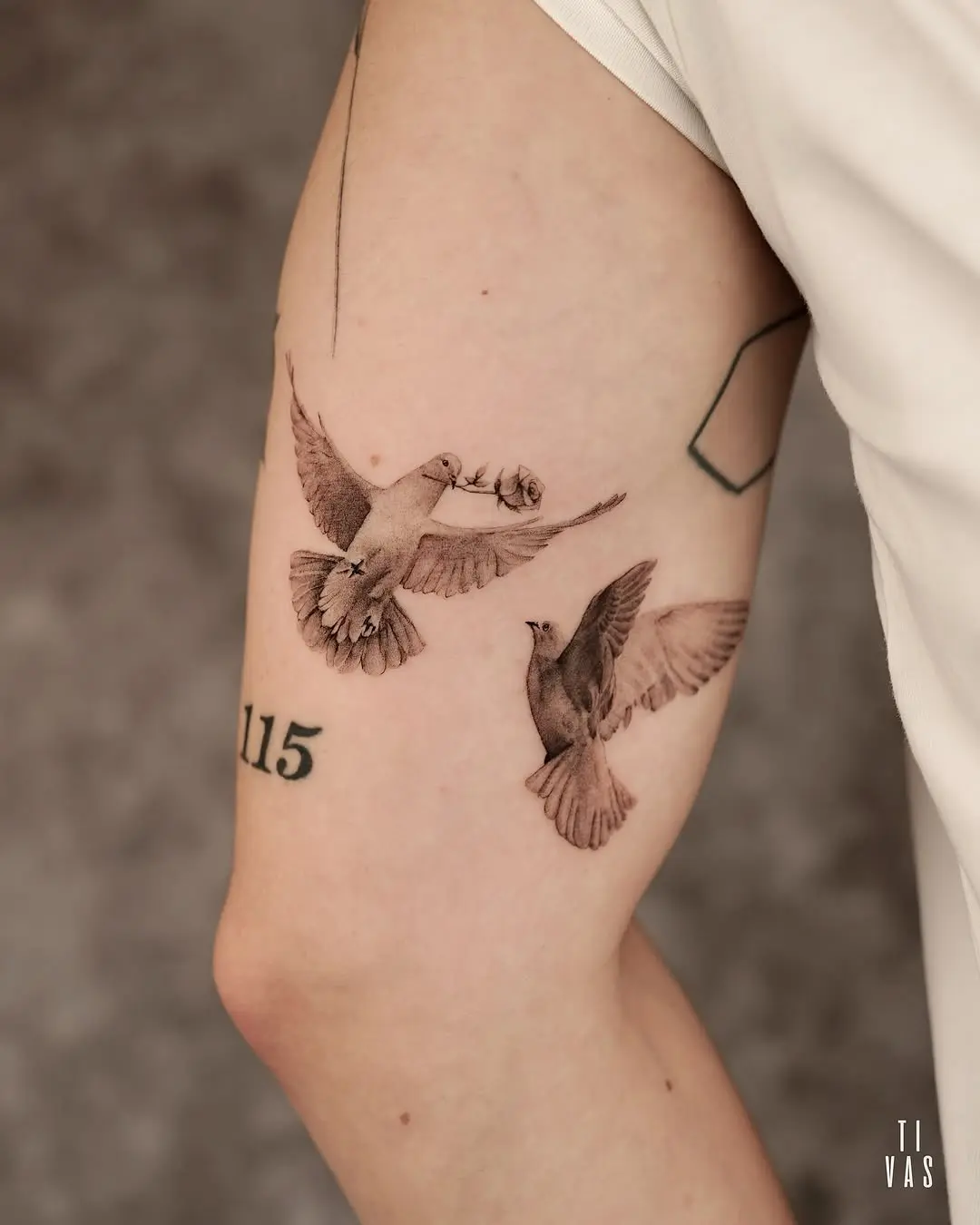 Elegant dove tattoos symbolizing love and peace