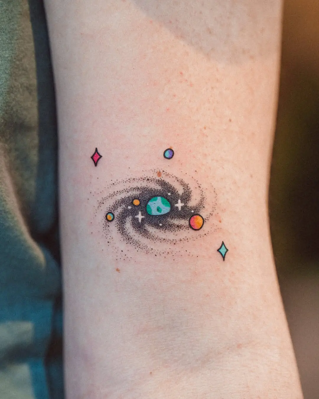 Vibrant Earth and Galaxy Inked Tattoo Design