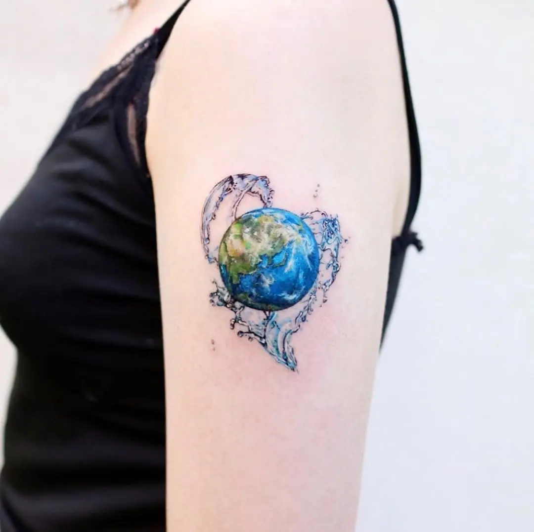 A vibrant earth tattoo with floral accents