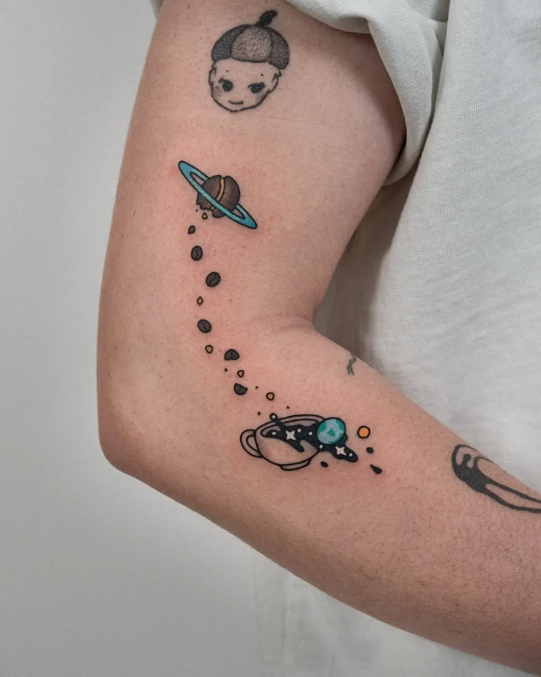 Charming Earth and Space-themed Tattoo Ideas