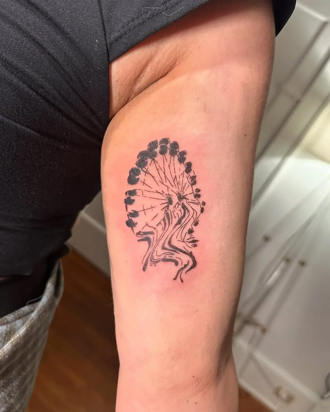 Elegant Ferris Wheel Tattoo on Arm
