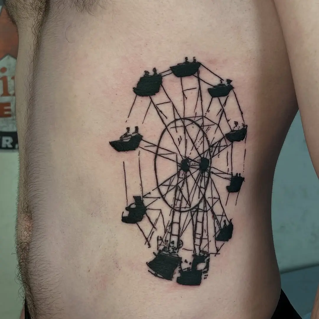 Artistic Ferris Wheel Tattoo on Rib