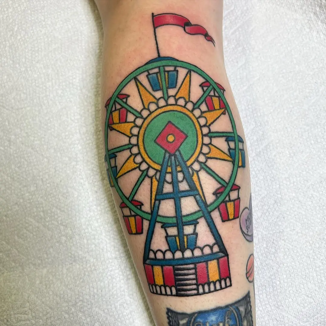 A vibrant ferris wheel tattoo for joy