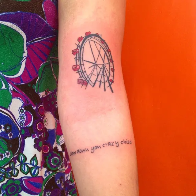 Whimsical Ferris Wheel Tattoo with Text