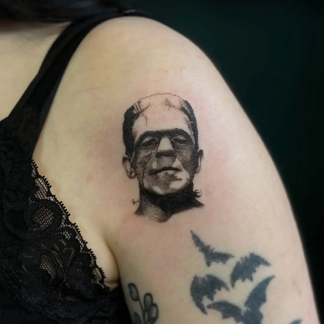 Intricate black and gray Frankenstein tattoo design