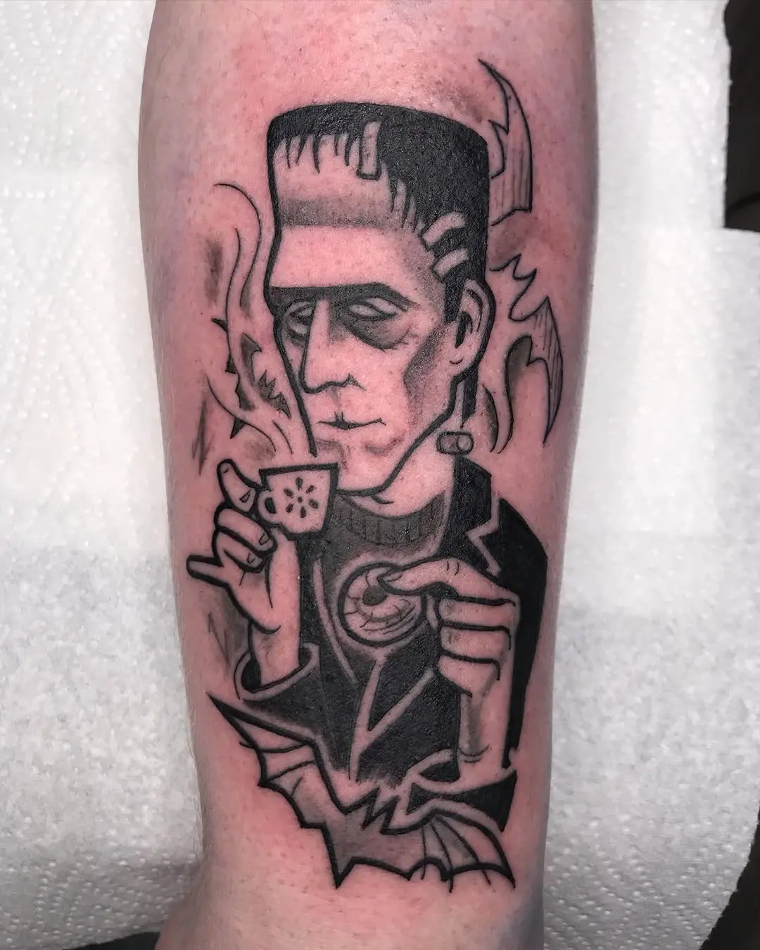 Frankenstein enjoys a coffee break tattoo