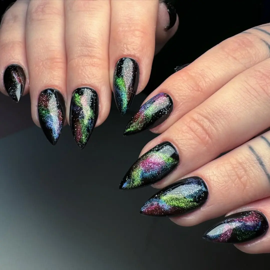 Vibrant Cosmic Galaxy-Inspired Nail Art