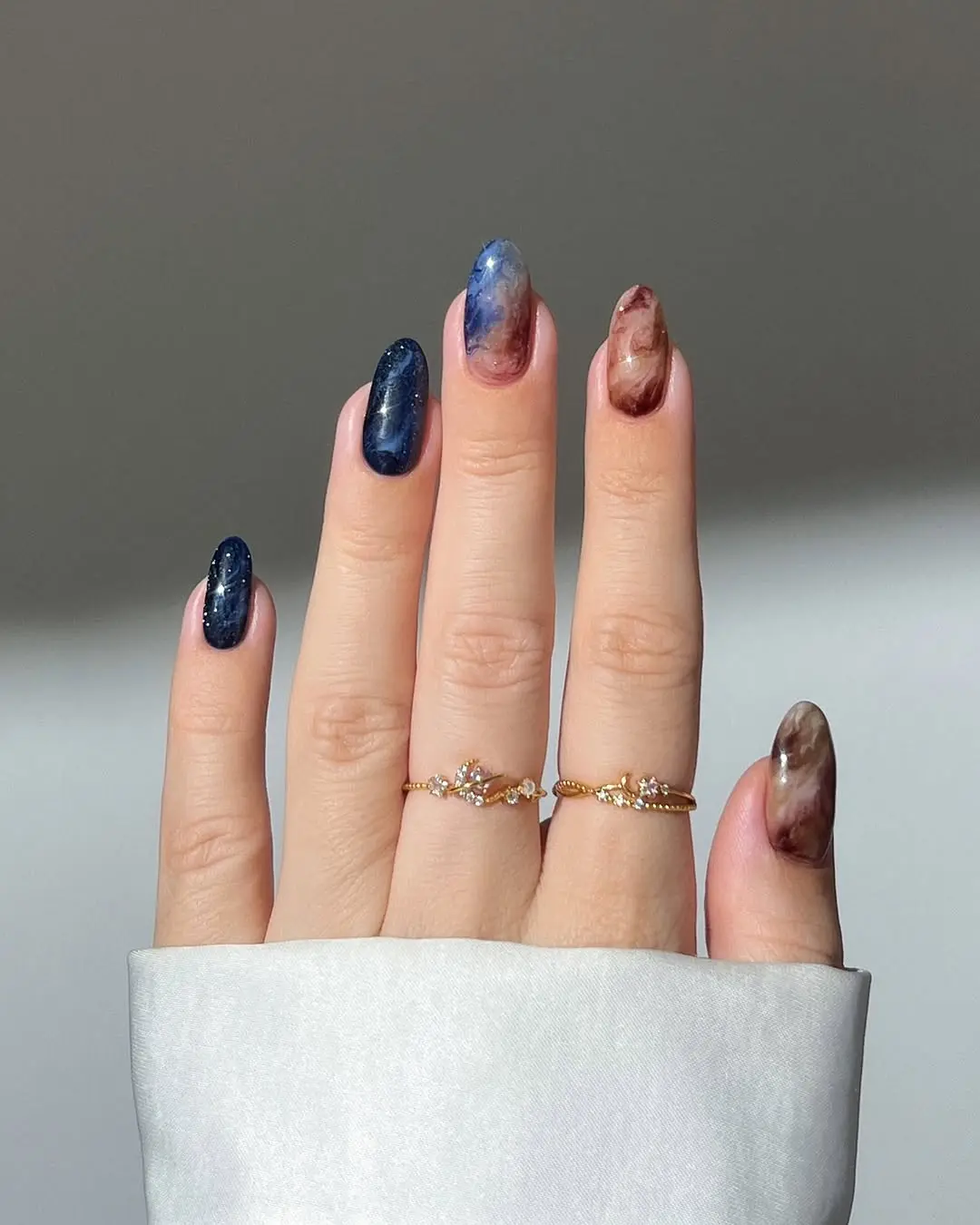 Cosmic-inspired nail art with stunning colors