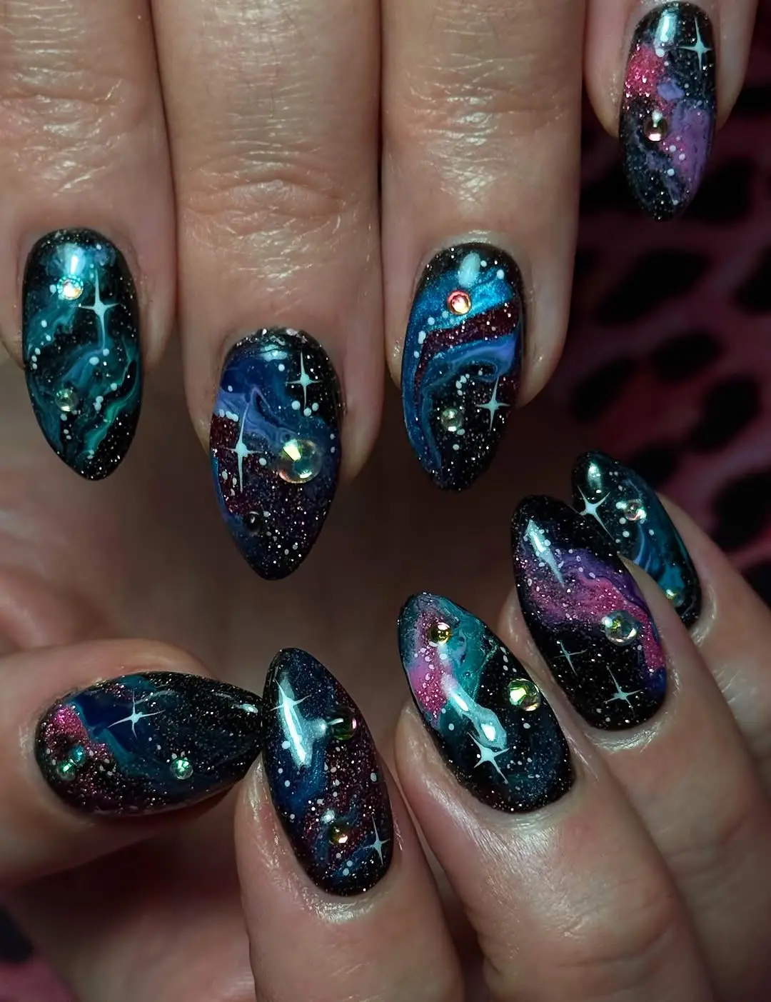 Stunning galaxy-inspired nail art design