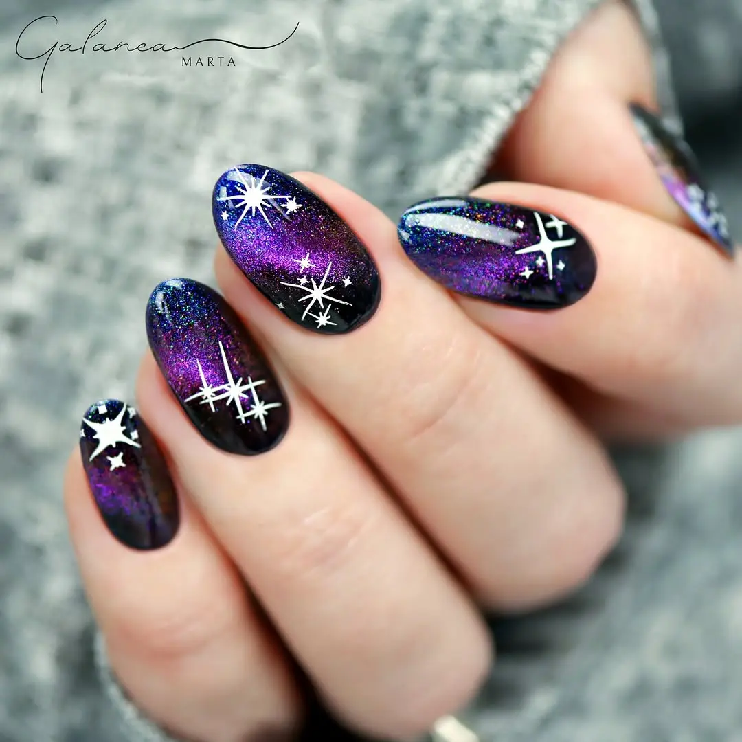 Vibrant galaxy nails with starry accents
