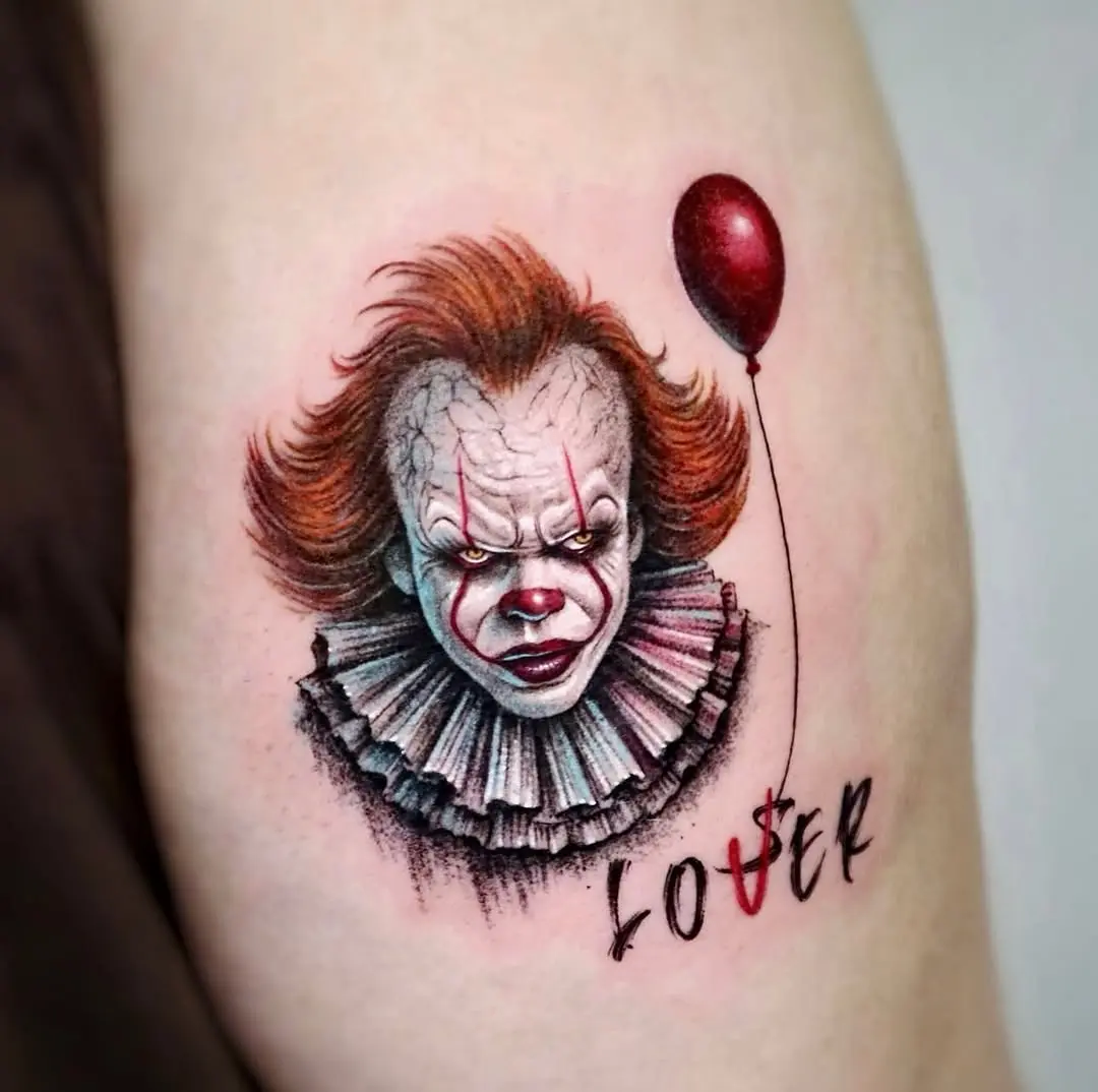 Creepy clown tattoo with haunting expression