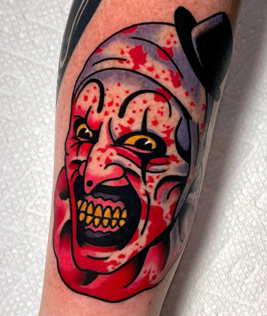 Bold and sinister clown tattoo design